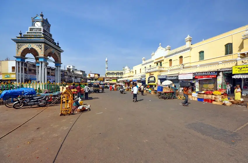Devaraja market historic clock tower and street view
