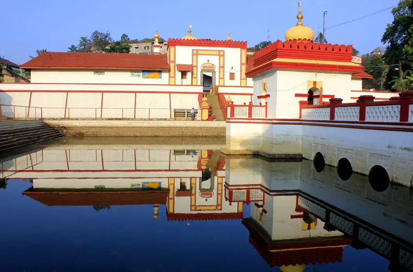 omkareshwara temple dome and water tank reflection