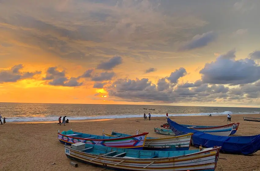 shanghumugham beach sunset and fishing boats view