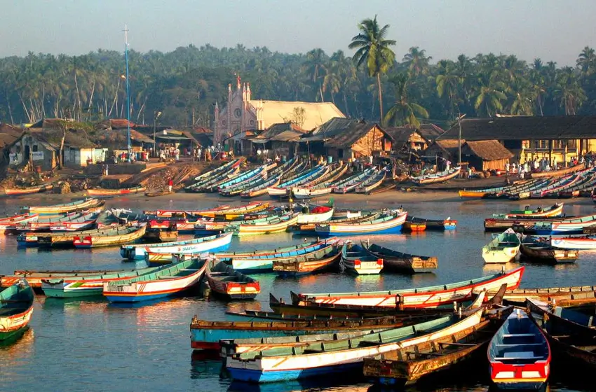 Vizhinjam fishing harbor boats and coastal village