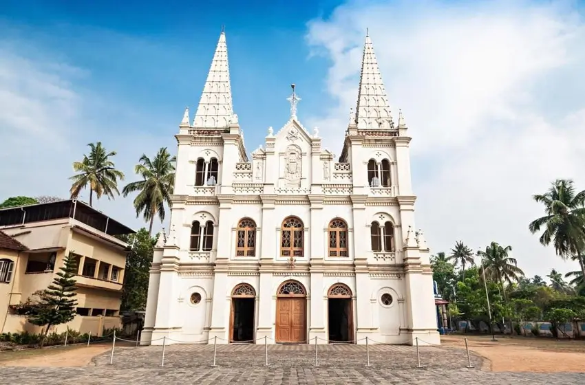 White colonial church twin spires facade